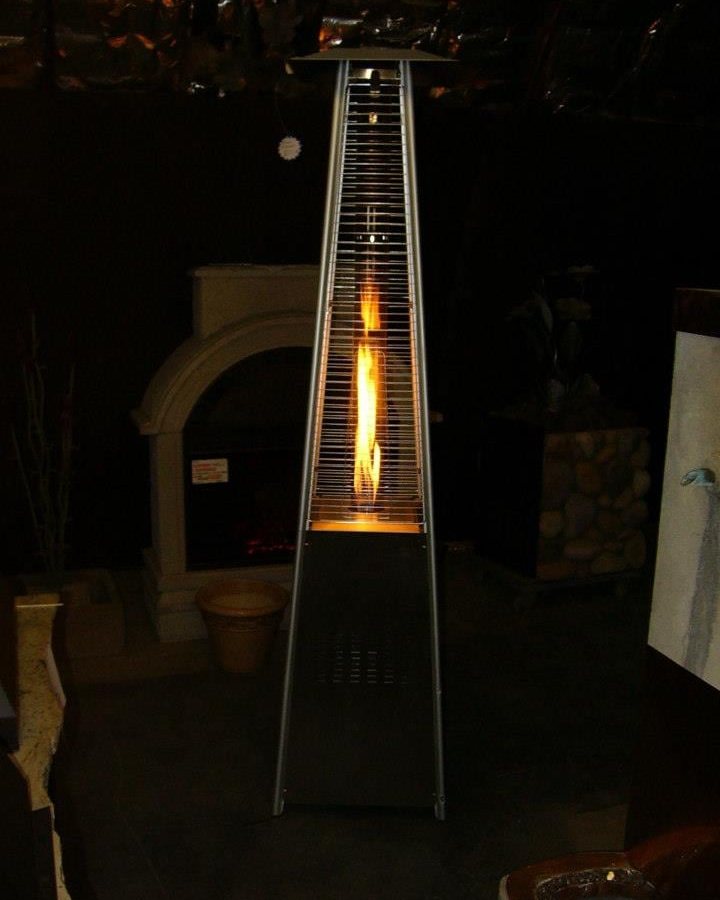 A pyramid flame patio heater lit in the showroom